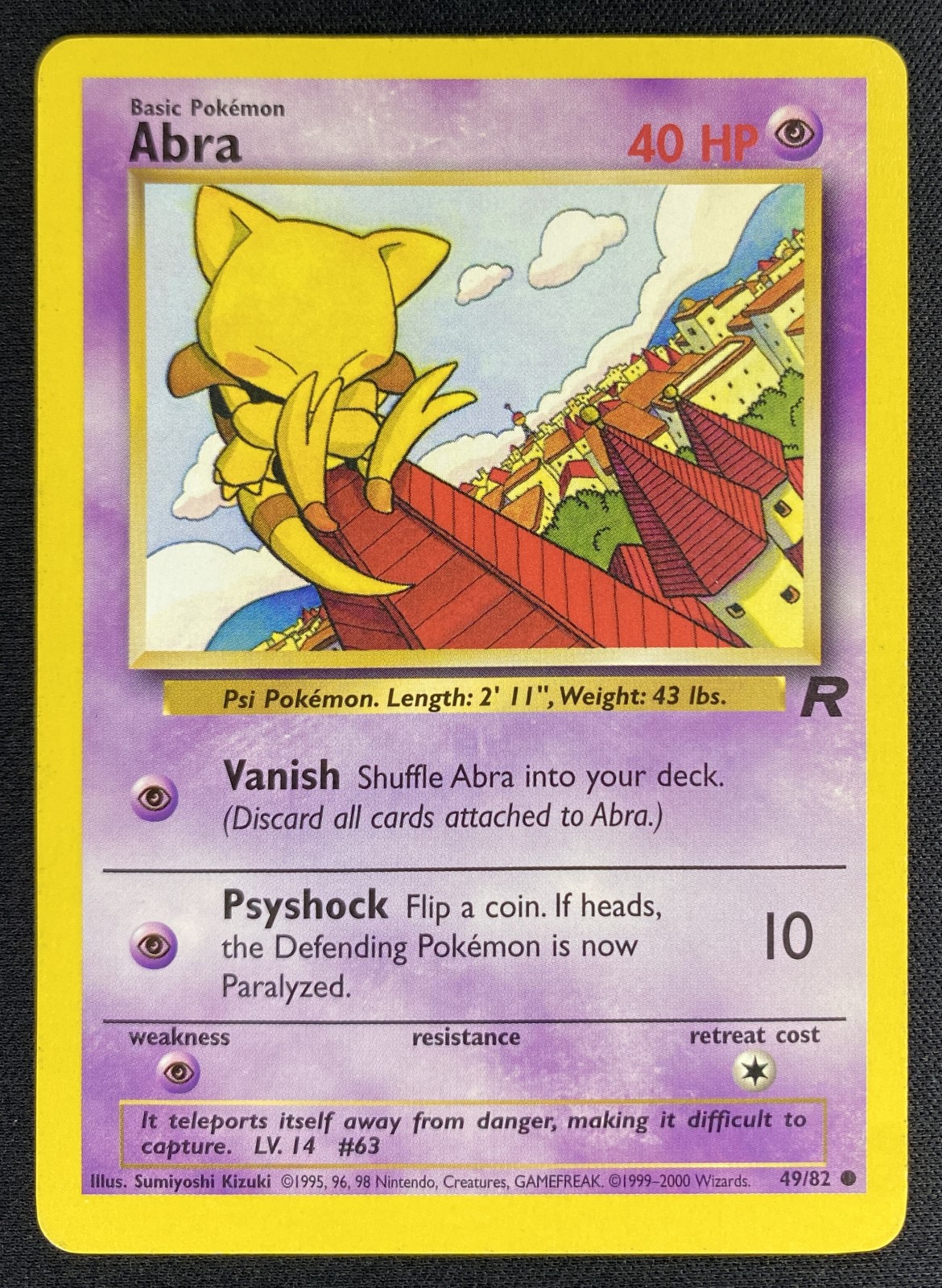 2000 Pokemon Team Rocket Abra #49/82 Common slab, front