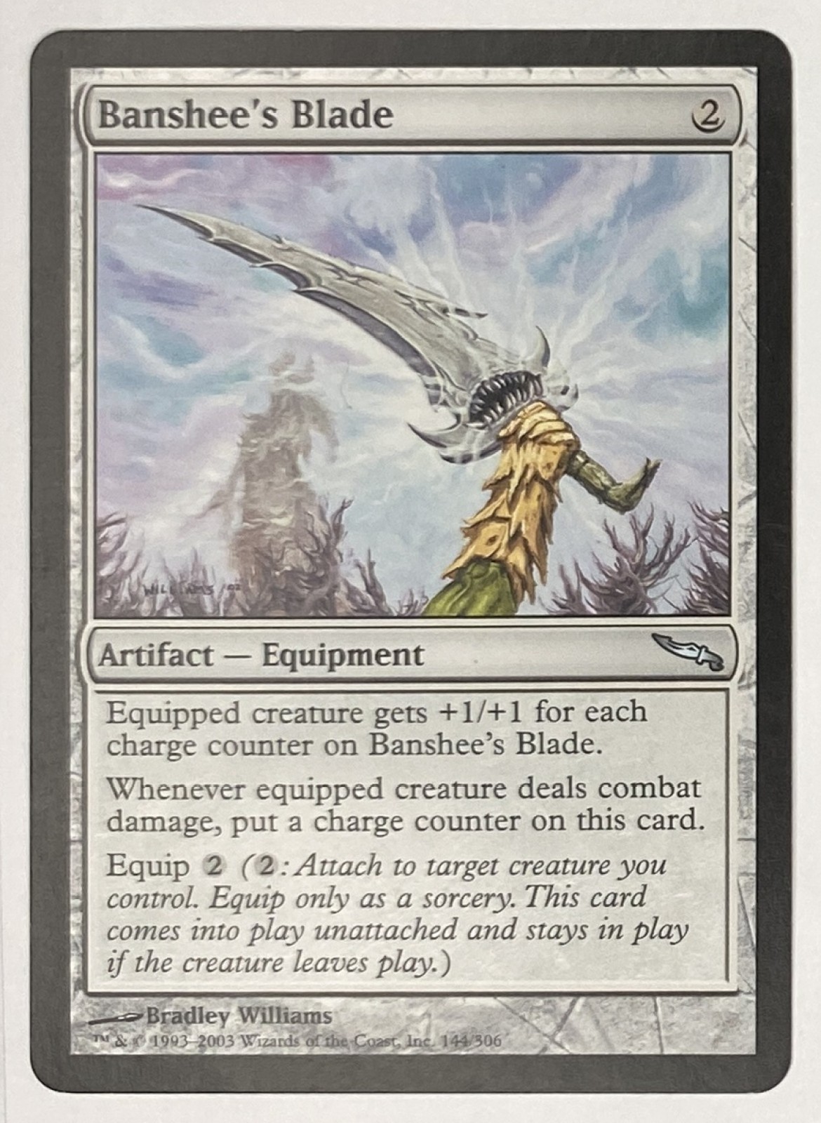2003 Magic: The Gathering Mirrodin Banshee's Blade #144/306 Uncommon front