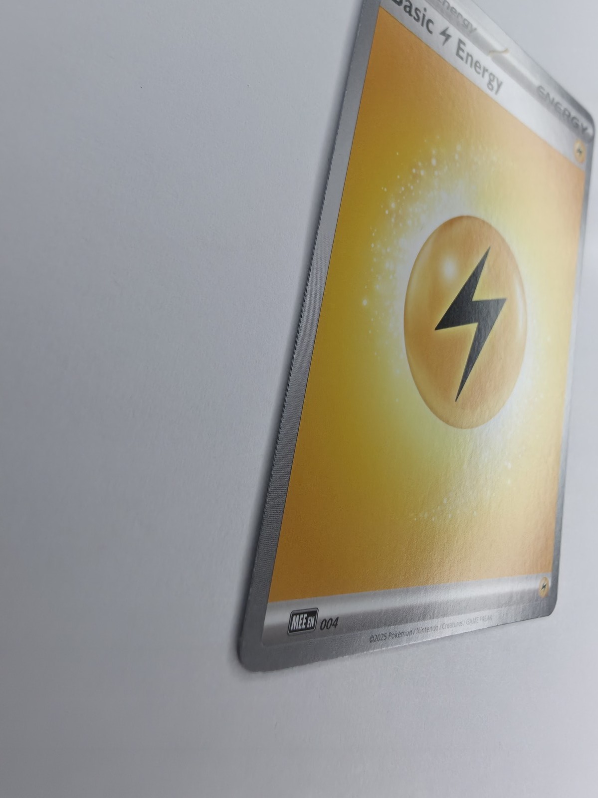 2025 Pokemon Mega Evolution Energies Basic Lightning Energy #004 Common front at an angle