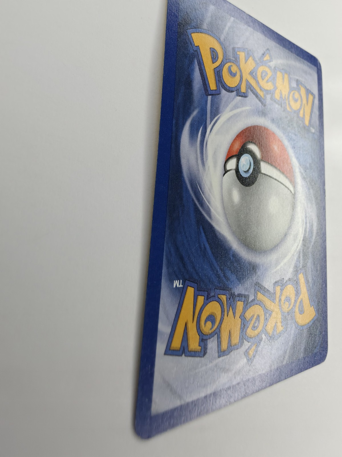 Blaine's Charmeleon, back gloss under raking light across ball and logo