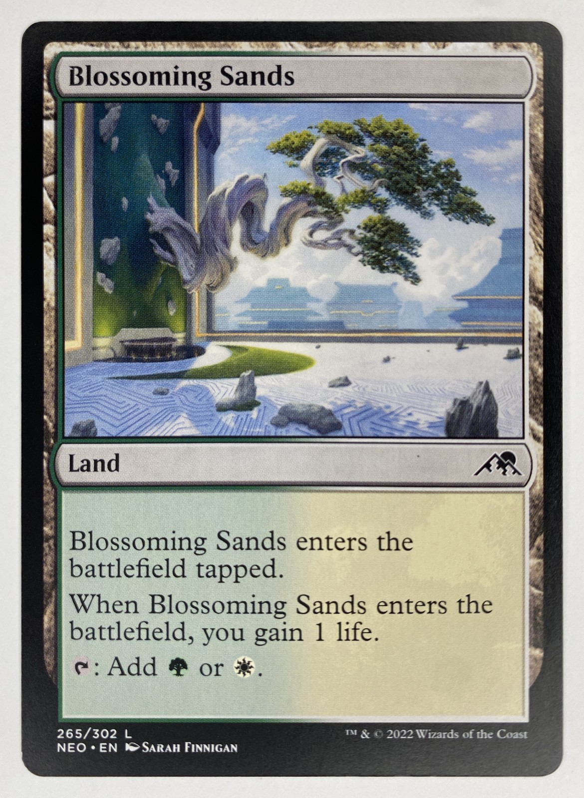 2022 Magic: The Gathering Kamigawa: Neon Dynasty Blossoming Sands #265/302 Land front