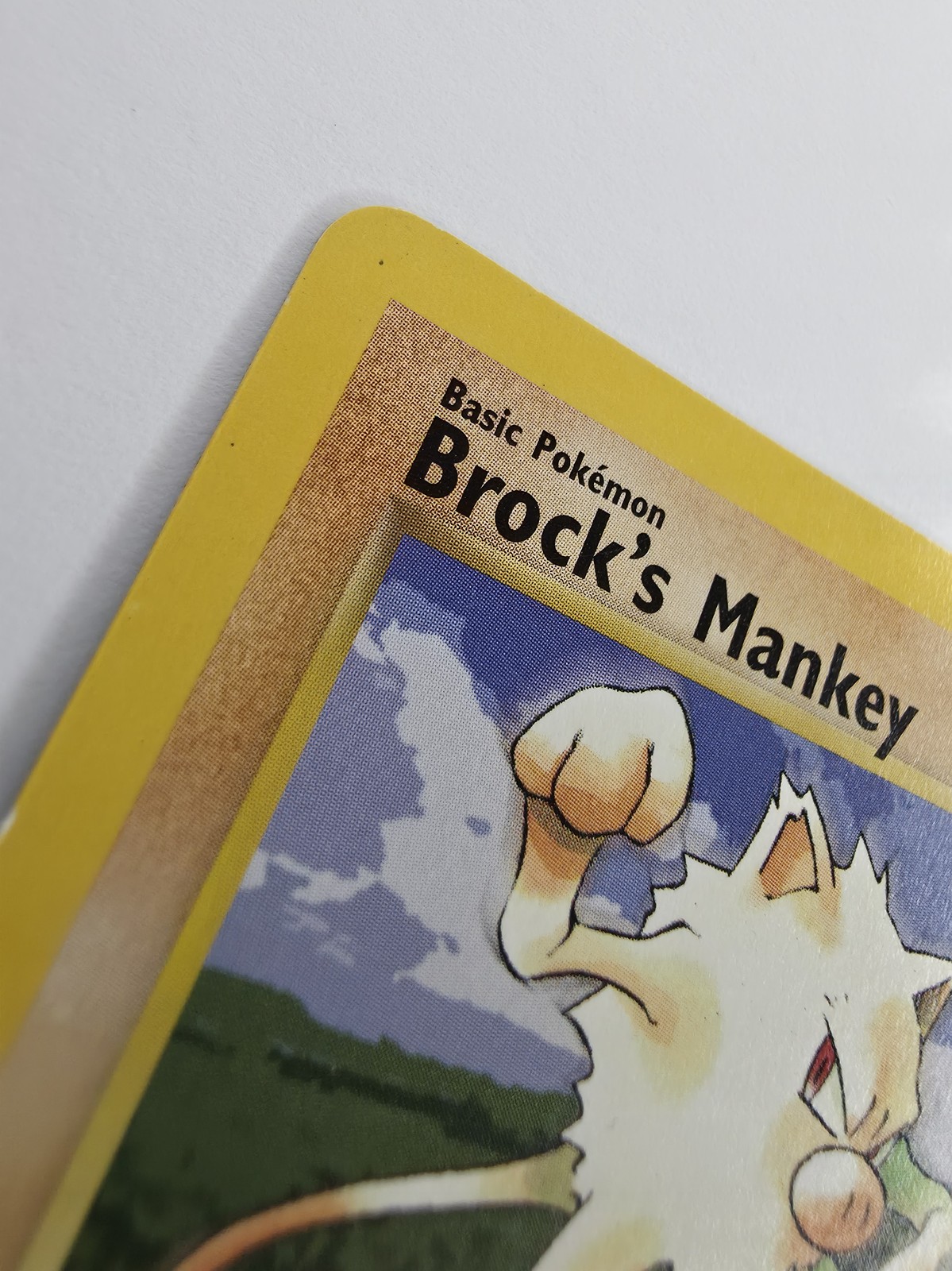 Brock's Mankey, front top-left corner and title, raking