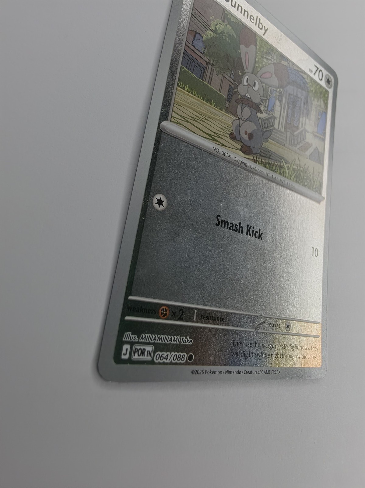 2026 Pokemon Perfect Order Bunnelby #064/088 Reverse Holo Common front at an angle