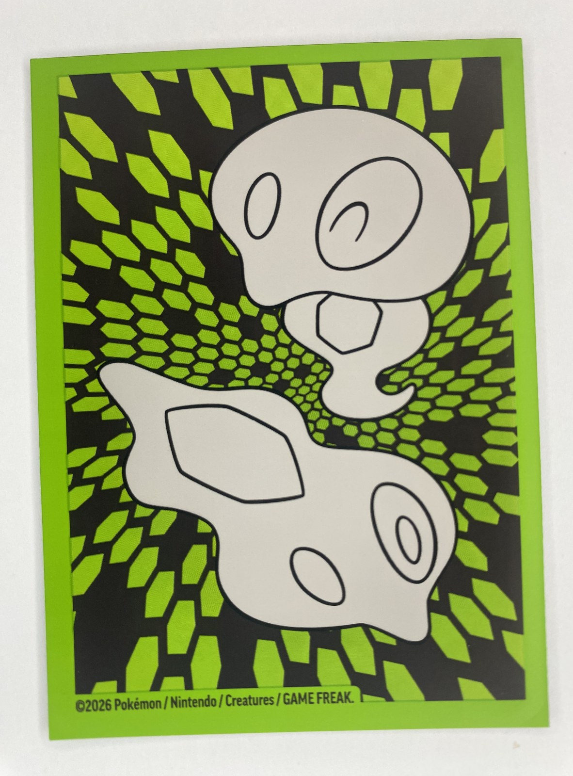 2 Pokemon Card Sleeves, Zygarde Cells Art, Lime Green, 2026, Unused second sleeve front