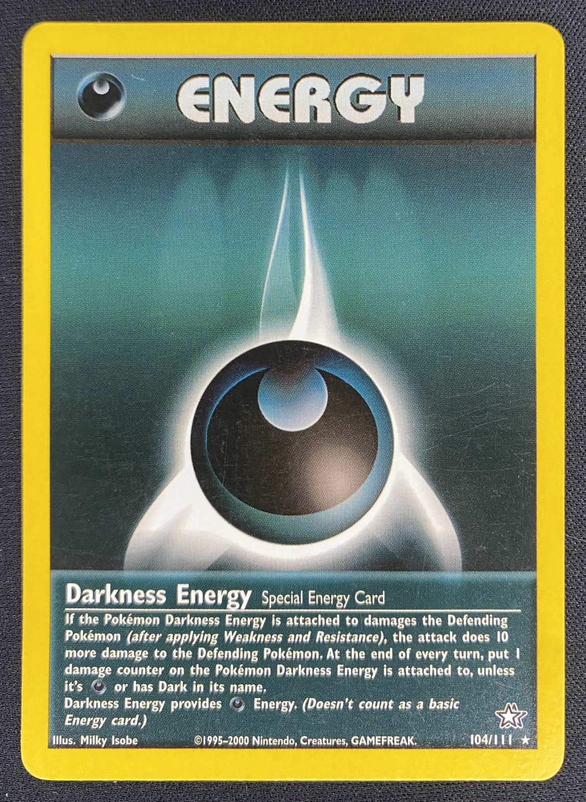2000 Pokemon Neo Genesis Darkness Energy #104/111 Rare front