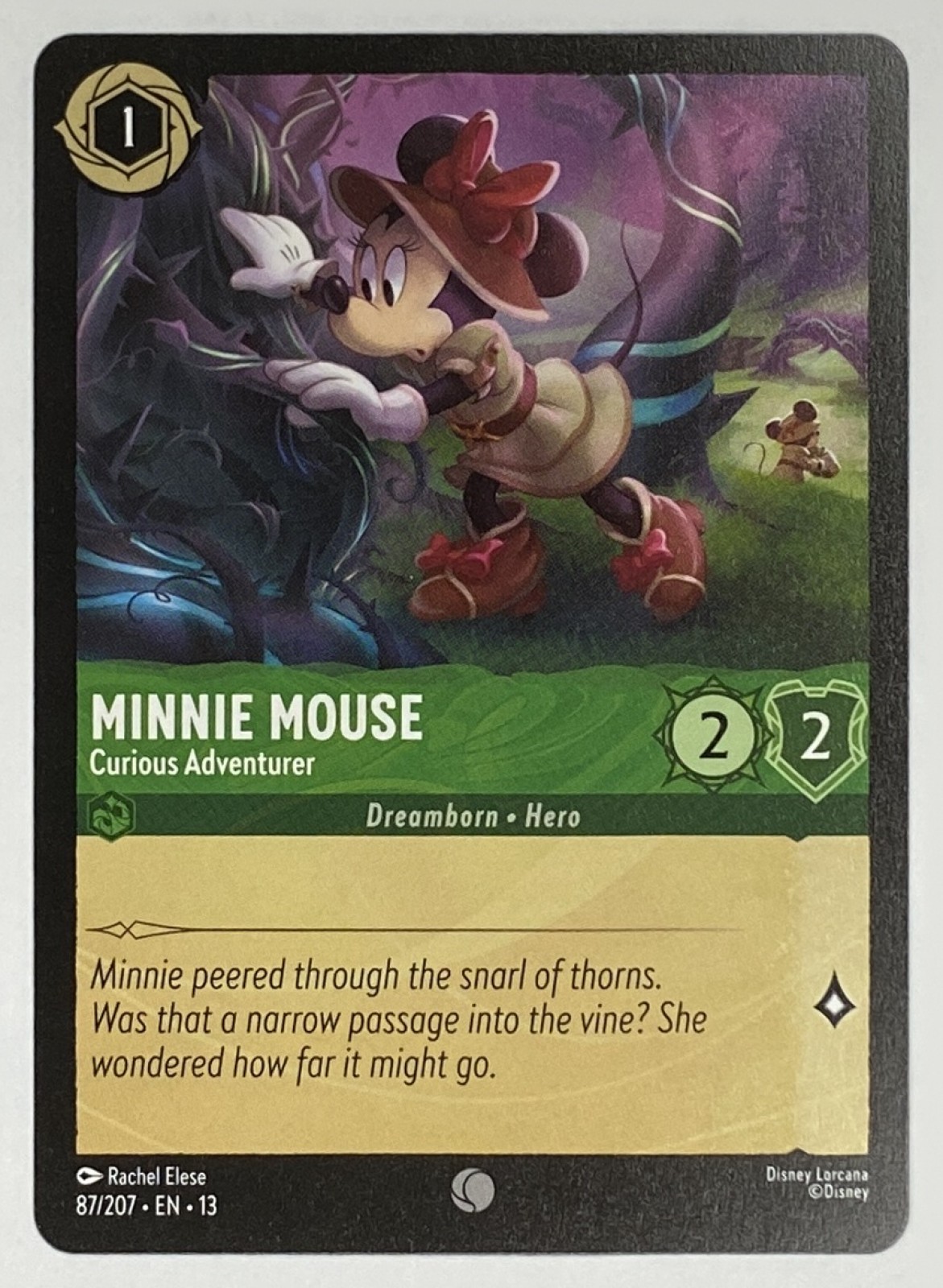 2026 Disney Lorcana Attack of the Vine! Minnie Mouse - Curious Adventurer #87/207 Common front