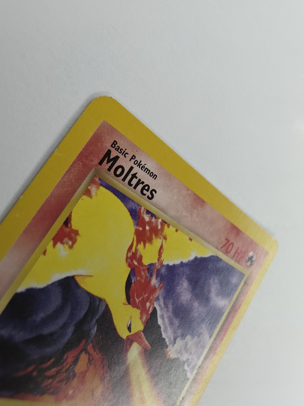 Moltres, front top-left corner and left edge, raking