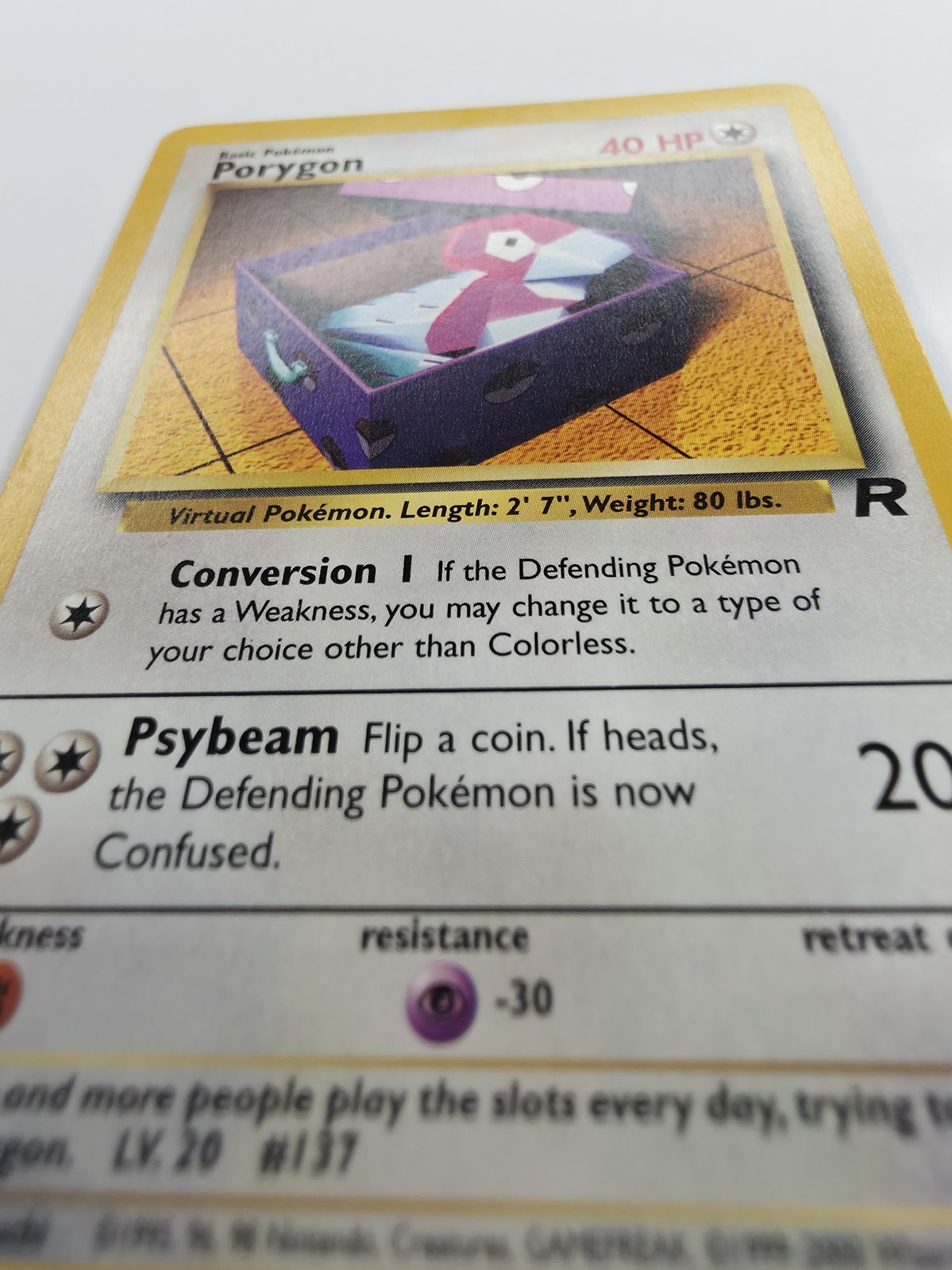 Porygon, front art and attack text from a low tilted angle