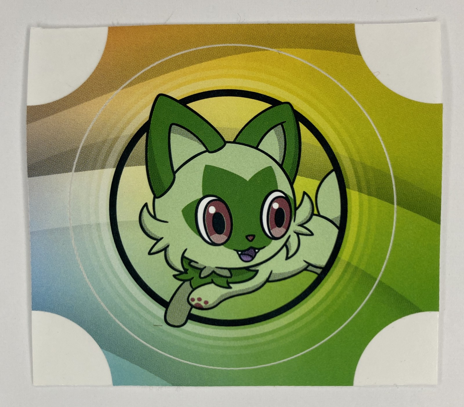 Pokemon Sprigatito Sticker, Square Peel-Off Sticker with Rainbow Swirl Background, Unused front