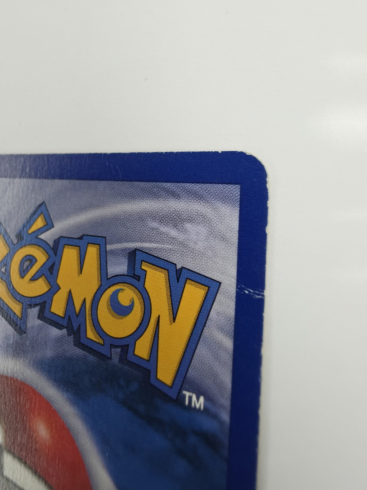 The back of the same Venusaur with a crease running in from the right edge.